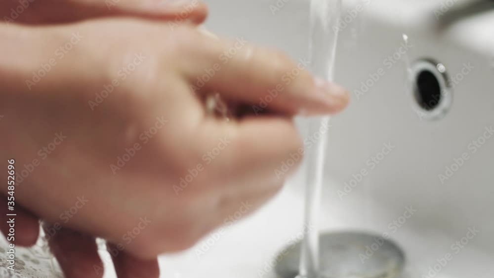 Close-up of the hands twist a piece of soap. Hand wash solid soap. Close-up of the hands twist a piece of soap. Hand wash solid soap.