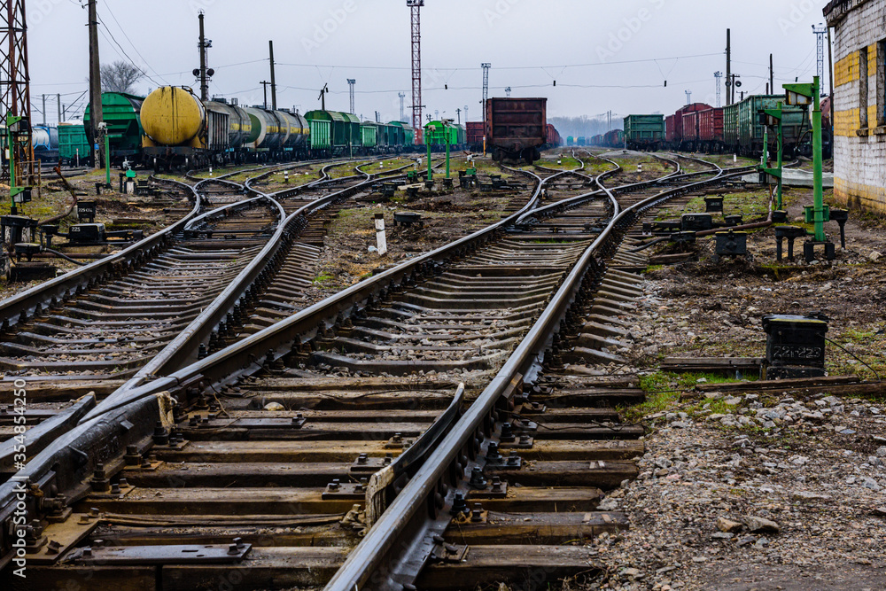 Many cargo trains at the sorting railway station