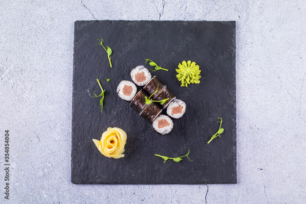 Obraz premium Sushi roll sushi with prawn, avocado, cream cheese, sesame. Sushi menu. Japanese food.