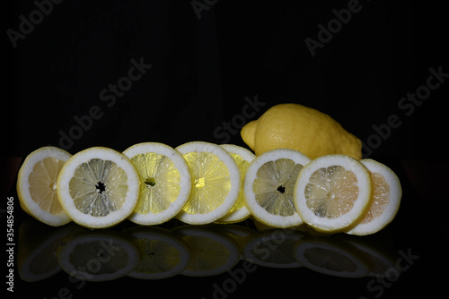 Fresh lemon on dark background