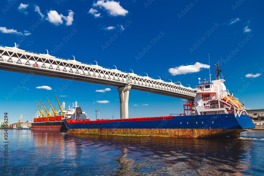 old large cargo ship in a river port