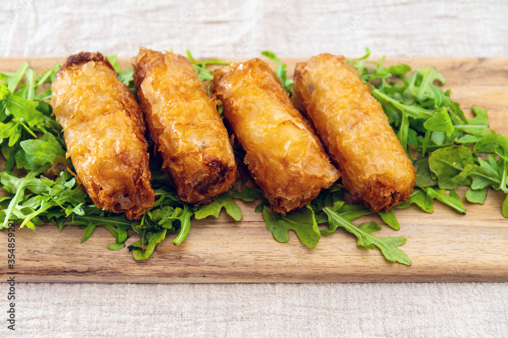 pork spring rolls Rice cakes stuffed with a pork stuffing accompanied by sauce pork spring rolls Rice cakes stuffed with a pork stuffing accompanied by sauce