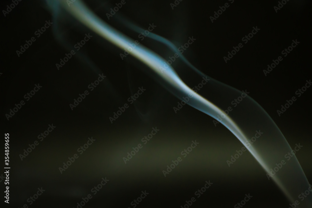 Smoke scented candles on a black background Smoke scented candles on a black background