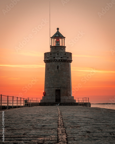 lighthouse at sunrise in Guernsey 