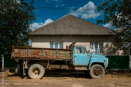 Old rusted truck parked in a street in Moldova in Eastern Europe