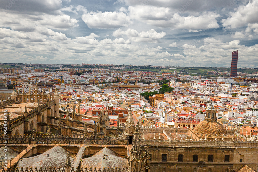 Panoramic view of the city of Seville from the buttresses of the gothic roof of the cathedral, Spain.