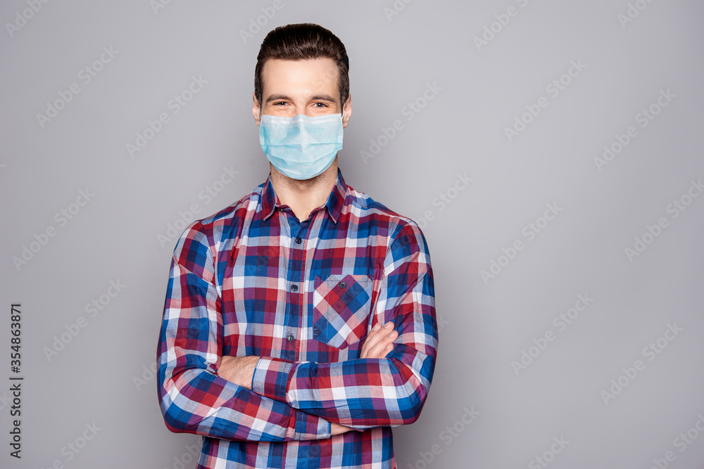 Portrait of his he attractive content guy wearing gauze mask folded arms vaccine preventive measures cov ncov infection influenza China Wuhan isolated over grey pastel color background Portrait of his he attractive content guy wearing gauze mask folded arms vaccine preventive measures cov ncov infection influenza China Wuhan isolated over grey pastel color background