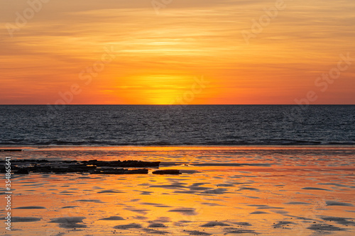 Sunset over the ocean at Cable Beach at sunset  Broome  Kimberley  Western Australia  Australia