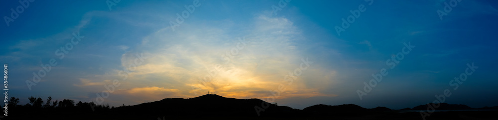 Dramatic sky with silhouette of mountain Dramatic sky with silhouette of mountain
