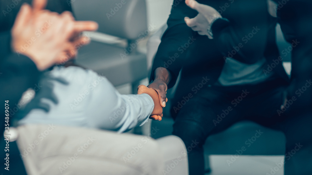 close up. business people greeting each other in the office.