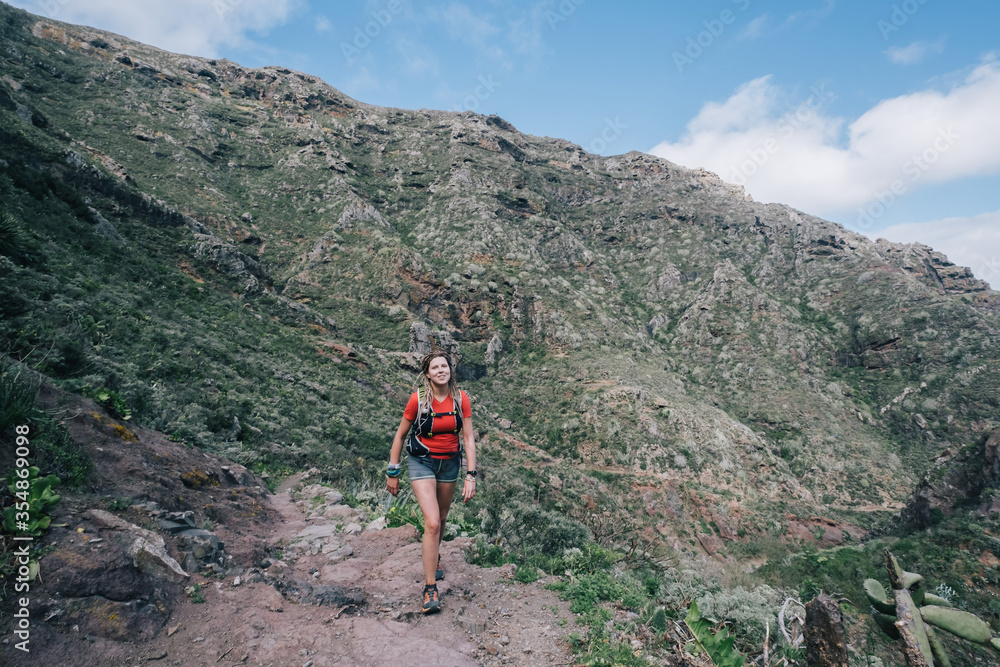 Sport running woman in cross country trail run