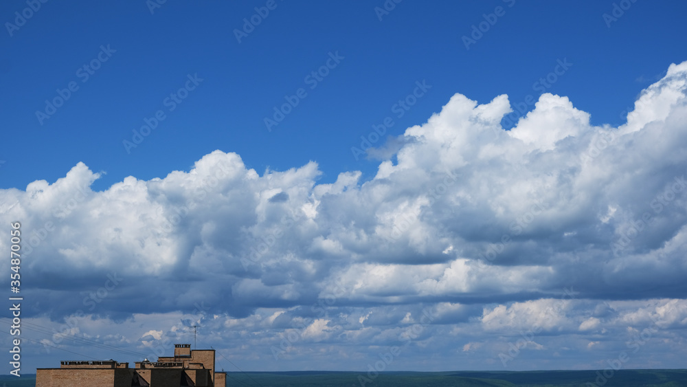 cumulus clouds over the Volga