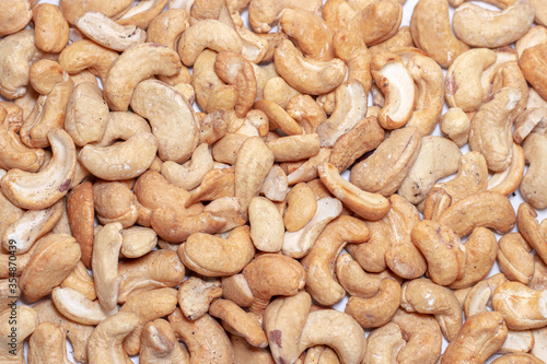 Roasted cashew nuts, texture and background.