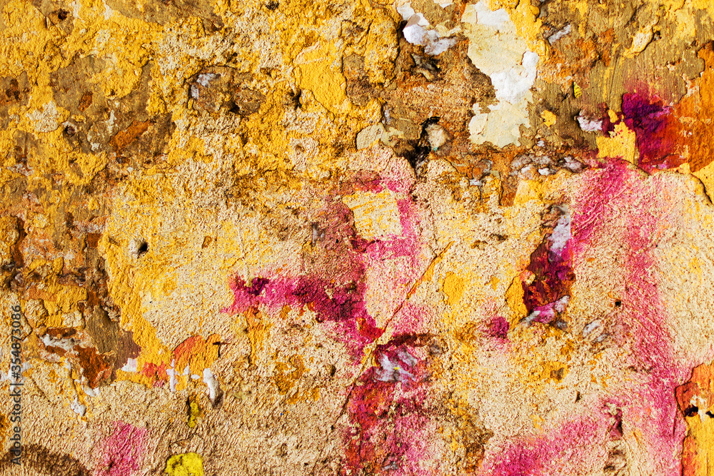 Naklejka premium Creative background beautiful concrete casually painted yellow and burgundy paint, cracks and scratches. Grungy concrete surface. Great background or texture for your project.