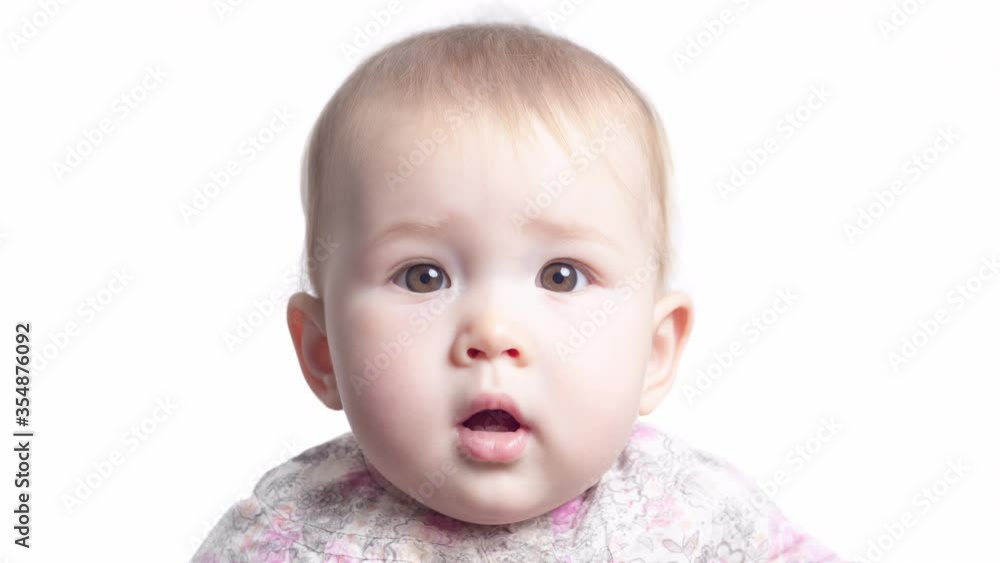 Face transformation of the little girl. Face of the infant baby seven monthes old smoothly transforms into the face of the same baby of one year old. Loopable version Face transformation of the little girl. Face of the infant baby seven monthes old smoothly transforms into the face of the same baby of one year old. Loopable version