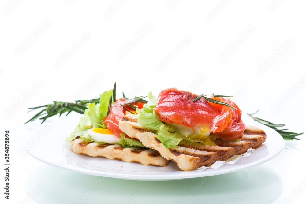 fried bread toast with salad leaves and salted red fish fried bread toast with salad leaves and salted red fish