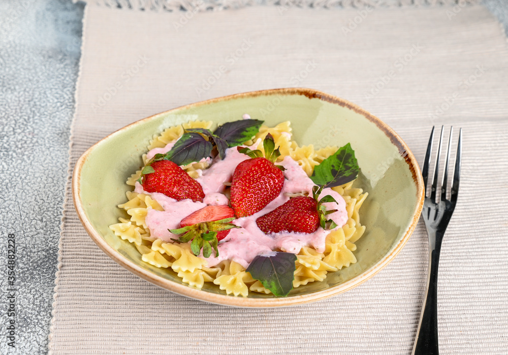 Pasta with strawberry cream and fresh strawberries and basil Pasta with strawberry cream and fresh strawberries and basil
