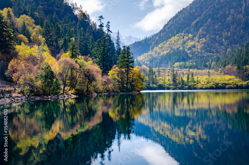 Beautiful multi-color pond at famous Jiuzhaigou National park in autumn, the world heritage site near Chengdu Chinal.