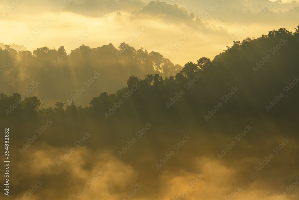 Beautiful Landscape of mountain layer in morning sun ray and winter fog. Beautiful Landscape of mountain layer in morning sun ray and winter fog.
