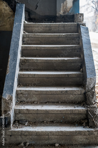 Stone staircase and entrance of an old abandoned building