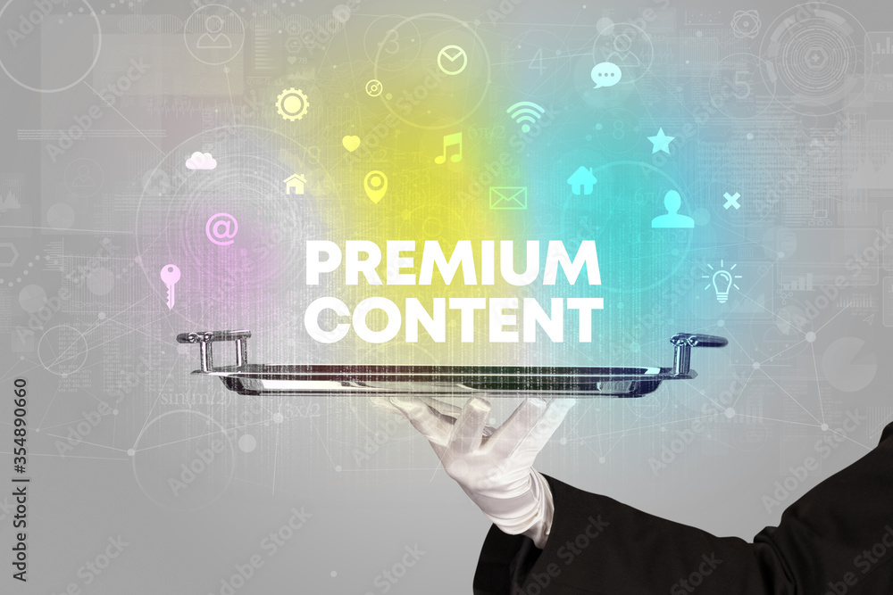Waiter serving social networking with PREMIUM CONTENT inscription, new media concept Waiter serving social networking with PREMIUM CONTENT inscription, new media concept