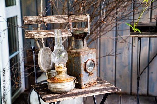 old railway signal lantern and kerosene lamp. retro vintage objects for interior.