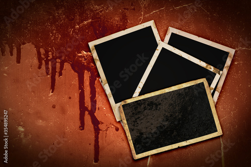 photo frames on bloody grunge background
