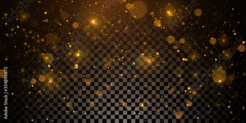 Sparkling golden particles, glowing bokeh lights isolated on dark transparent background	 photo