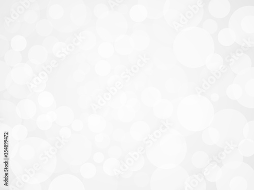White defocused light background. Flickering lights. Abstract festive background with bokeh