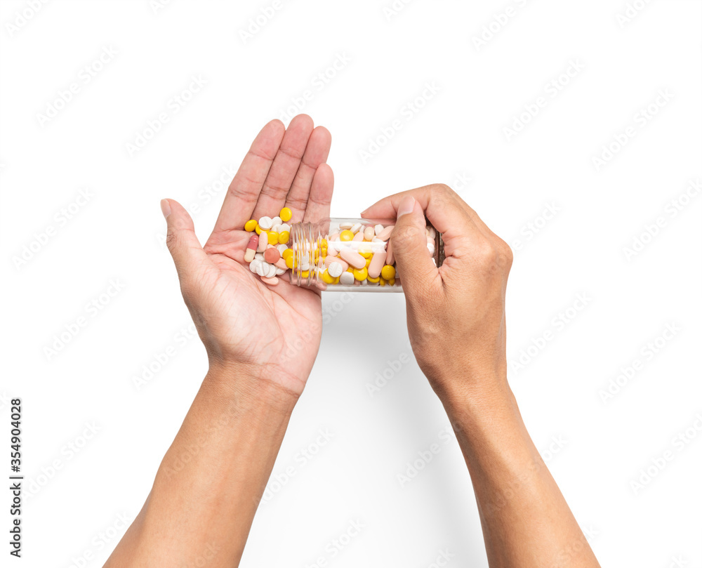 hand with pill in bottle on white background hand with pill in bottle on white background