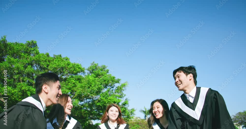 group happy graduates throw caps Stock Video Adobe Stock
