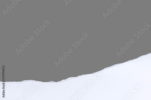White ripped note paper, paper different shapes scraps isolated on gray background. with clipping path. © Anucha