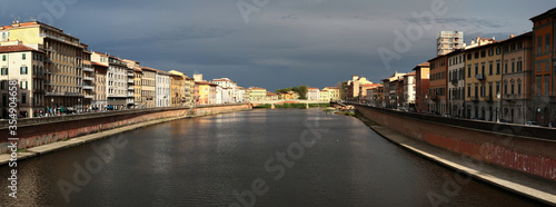 Panoramic view of Arno River embankment. Pisa. Italy.