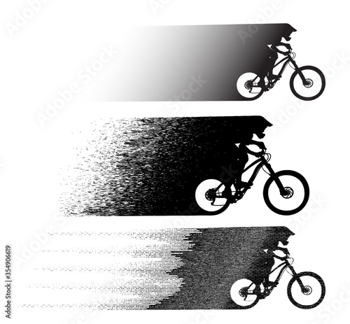 Silhouette of a cyclist riding a mountain bike