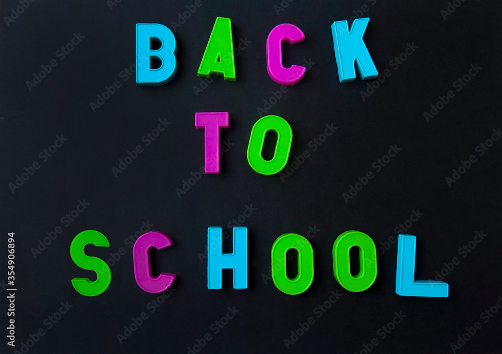Back to school colorful alphabet letters on the black background. Back to school colorful alphabet letters on the black background.