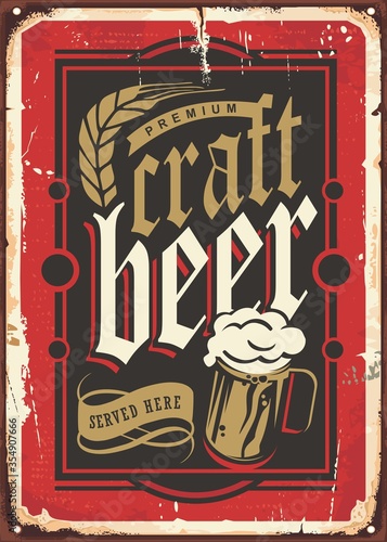 Premium craft beer served here vintage pub sign on old metal texture.