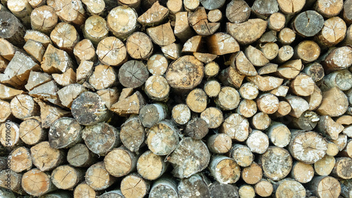 hardwood firewood stacked in a heap  horizontal backgrounds and textures