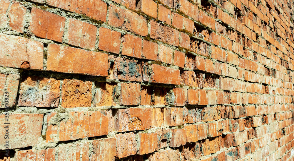 Obraz premium old red brick wall with destruction backgrounds, textures