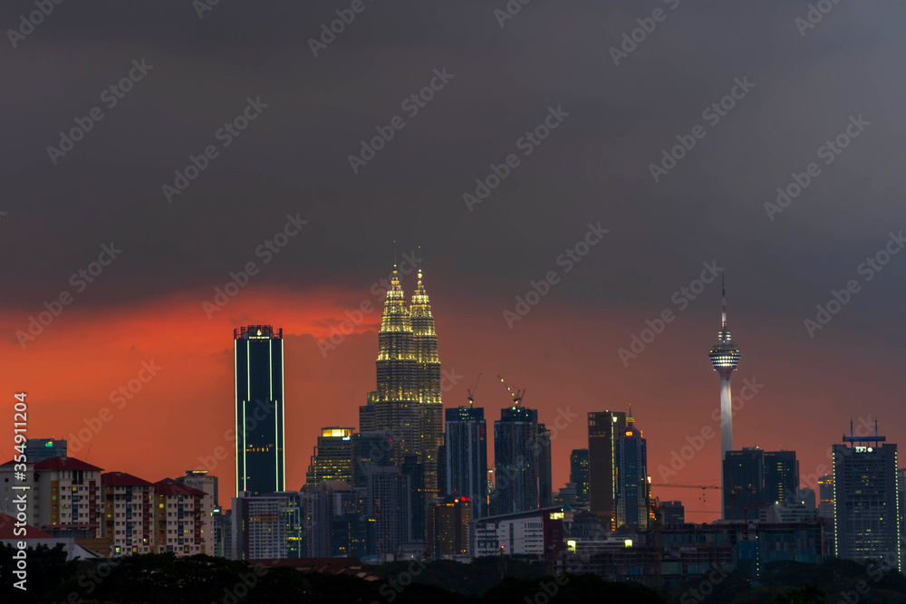 Kuala Lumpur city skyline at night.