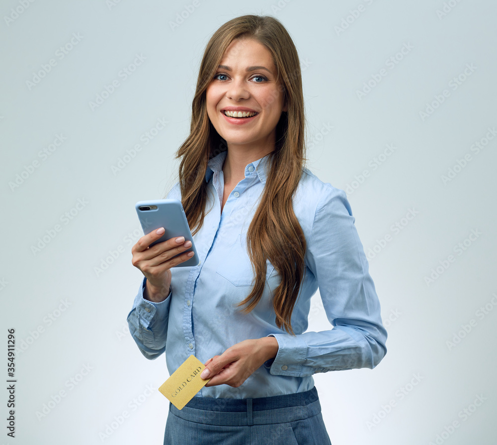 Woman using credit card for on line payment with smartphone. Woman using credit card for on line payment with smartphone.