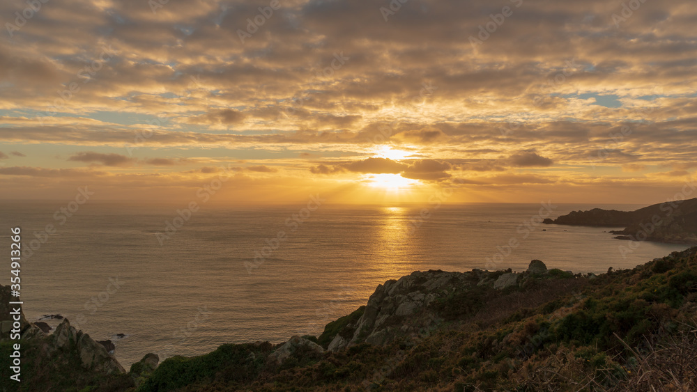 sunset over the sea, view from the cliffs