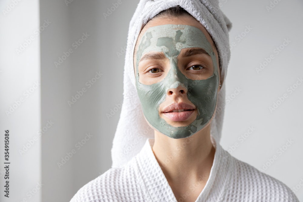 A real girl makes a clay mask at home A real girl makes a clay mask at home
