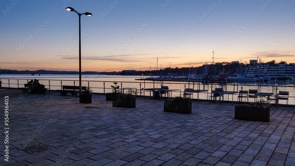 Summer sunset over the Tamar River from the Royal William Yard, Plymouth, Devon, UK