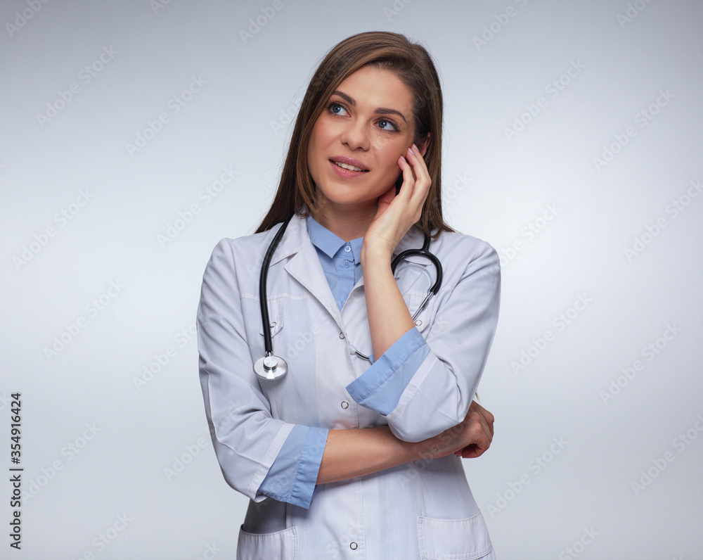 Young woman doctor dressed white medical uniform. Young woman doctor dressed white medical uniform.