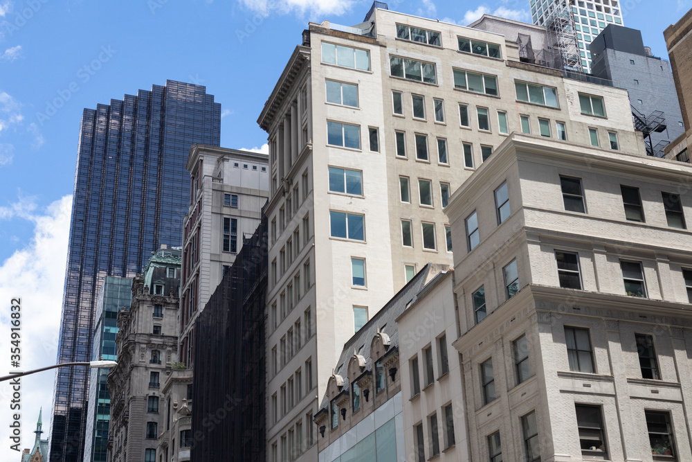 A Variety of Buildings and Skyscrapers on Fifth Avenue in New York City A Variety of Buildings and Skyscrapers on Fifth Avenue in New York City