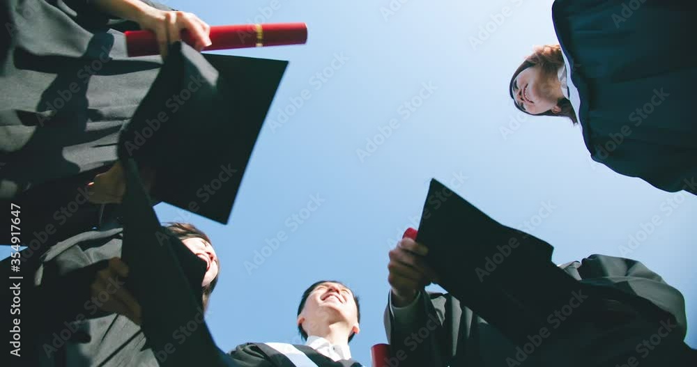group happy graduates throw caps Stock Video Adobe Stock