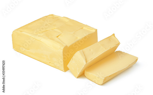 Block of butter isolated on white background