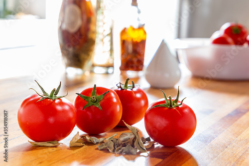 grouped tomatoes in kitchen preparation