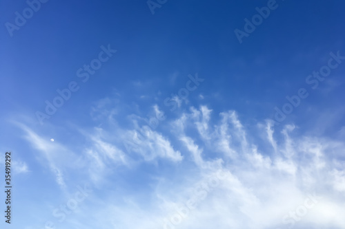Fototapeta Naklejka Na Ścianę i Meble -  Dramatic panorama view of buautiful form of soft white clouds, moon and summer morning blue sky for meteorology forcast background.