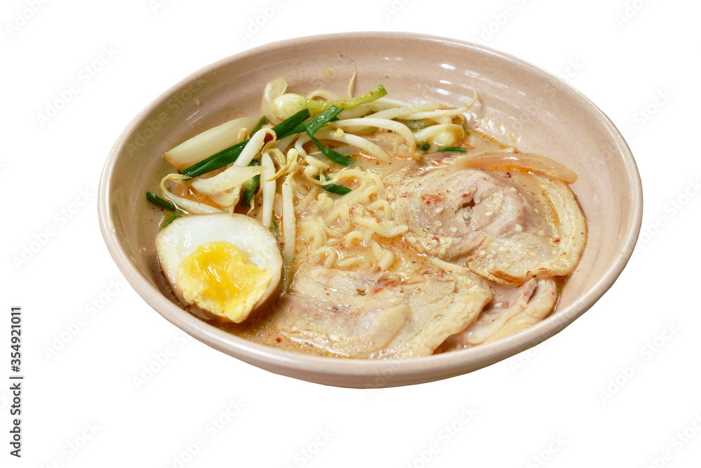 miso ramen or Japanese yellow noodles topping slice braised pork in soybean soup on bowl miso ramen or Japanese yellow noodles topping slice braised pork in soybean soup on bowl